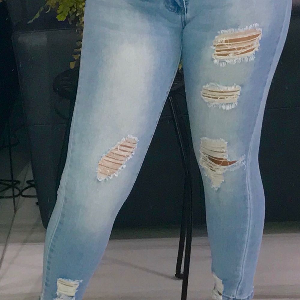Light washed Blue Ripped Jeans